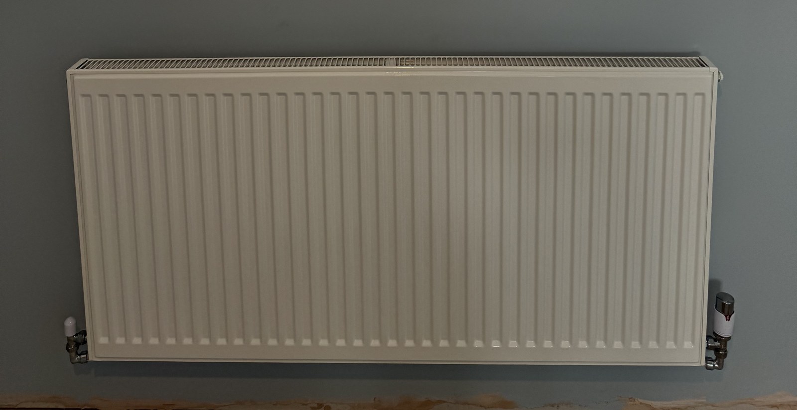 A newly installed radiator, fitted by Instantheat