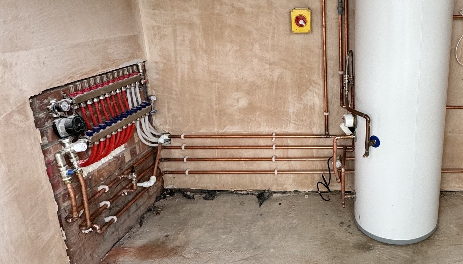 Underfloor heating manifold and pipework installed by Instantheat